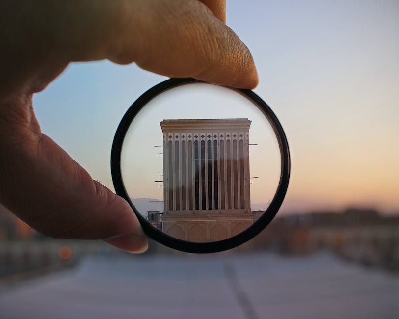 An image depicting a magnifying glass searching for keywords, symbolizing the importance of keyword research in business operations.