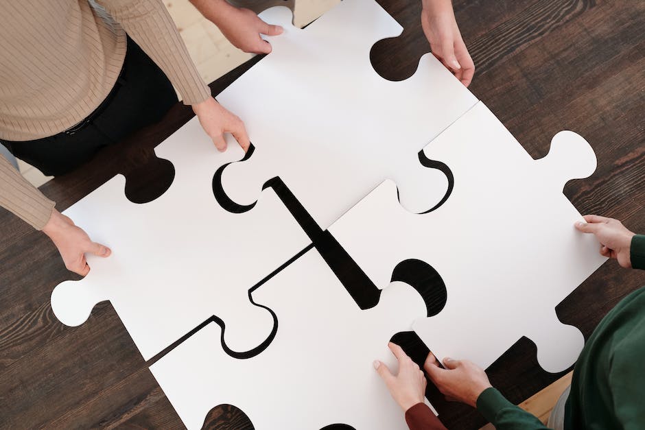 An image depicting the importance of a website content strategy, showing puzzle pieces forming a complete solution